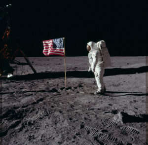 Astronaut Edwin “Buzz” Aldrin poses with the American flag on the moon's surface, July 20, 1969. photo: Neil Armstrong, NASA 